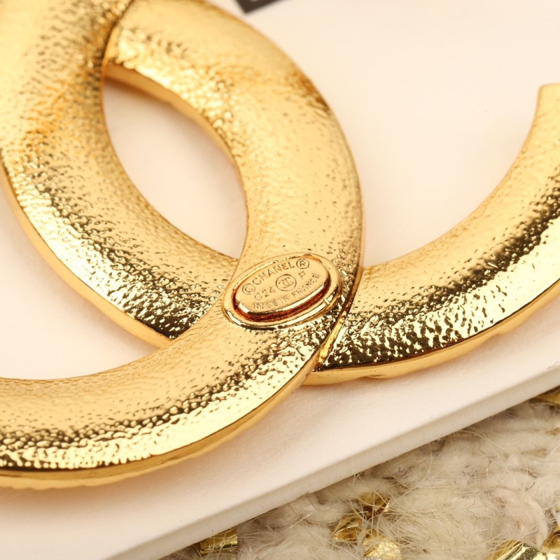 Ch**el brooches